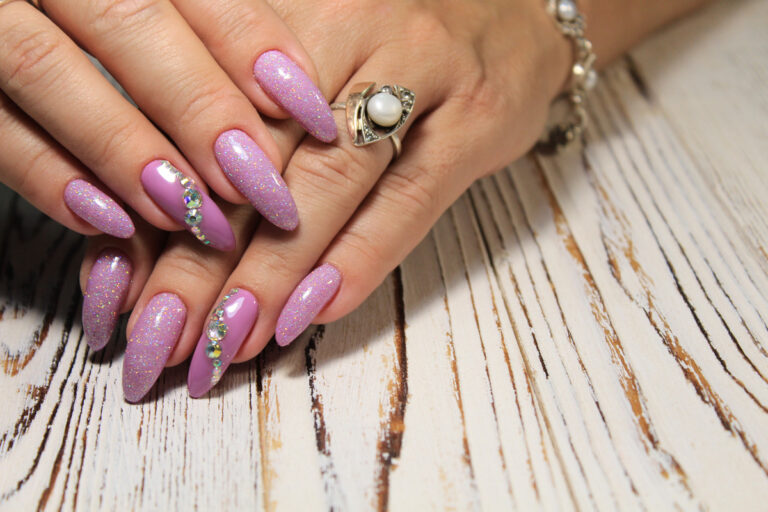 Read more about the article Classic Manicure: A timeless choice featuring nail shaping, cuticle care, a relaxing hand massage, and your choice of polish.